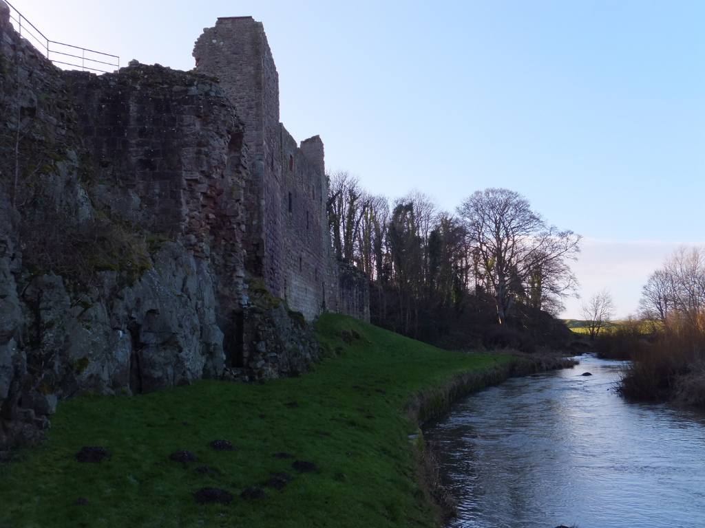 Hailes Castle is a picturesque and substantial ruinous old fortress, perched on a rocky crag above the River Tyne near East Linton in East Lothian, long held by the Hepburn family and associated with Mary Queen of Scots.