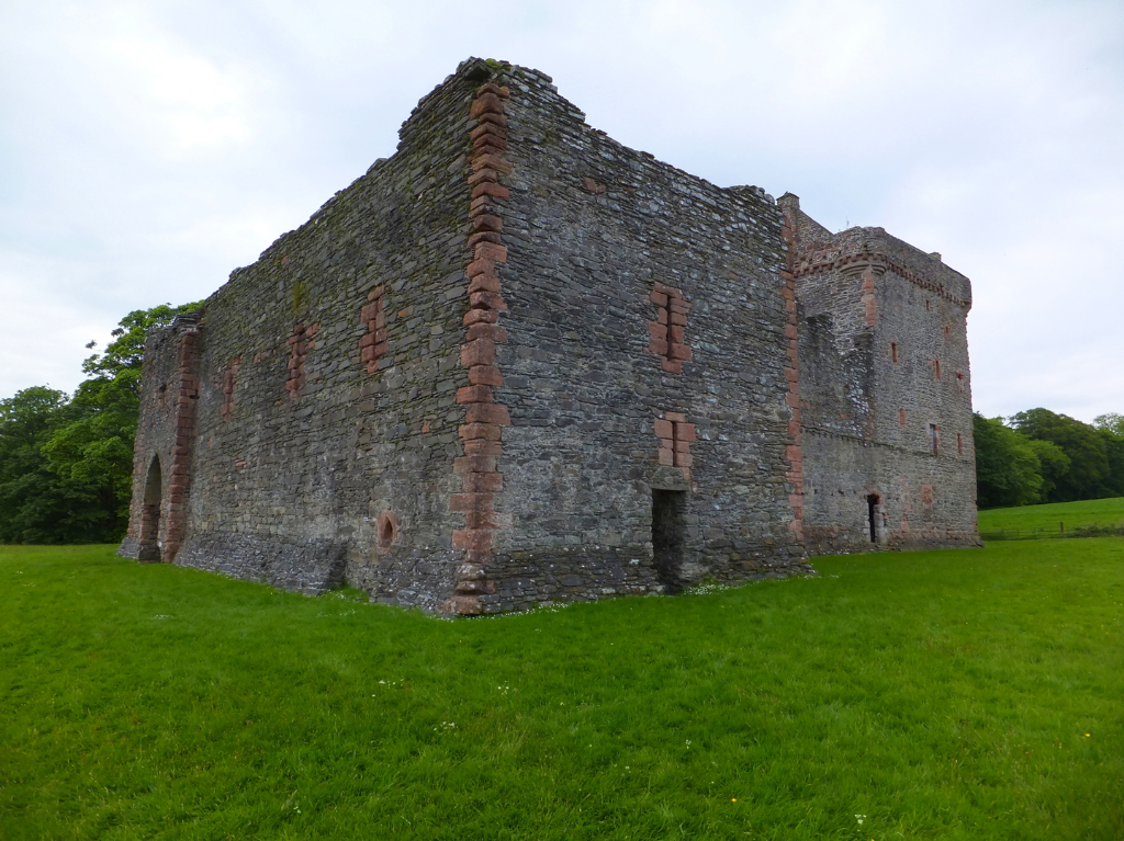 Skipness Castle, a large and scenic tower and courtyard overlooking Kilbrandon Sound and Arran, long held by the Campbells and near Tarbert in Kintyre on the west coast of Scotland.