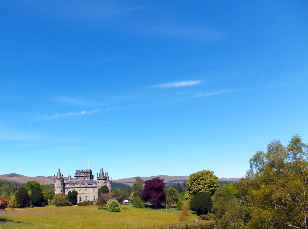 Inverary Castle, a magnificent towered mansion, the seat of the Campbell Dukes of Argyll and located among colourful gardens in a beautiful spot by Loch Fyne near the attractive burgh of Inveraray in Arygll.