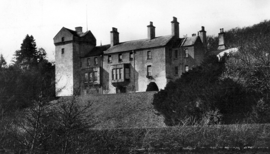 Branxholme Castle, a fine old castle and mansion, long held by the Scotts of Buccleuch, in a pretty wooded spot near Hawick in the Borders of Scotland.