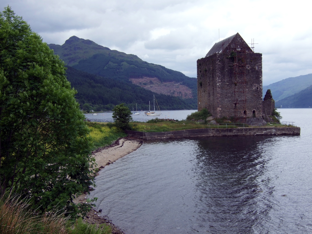 Carrick Castle, an impressive old tower house in a pretty spot on the banks of Loch Goil, long held by the Campbells and near the village of Lochgoilhead in Argyll in western Scotland.