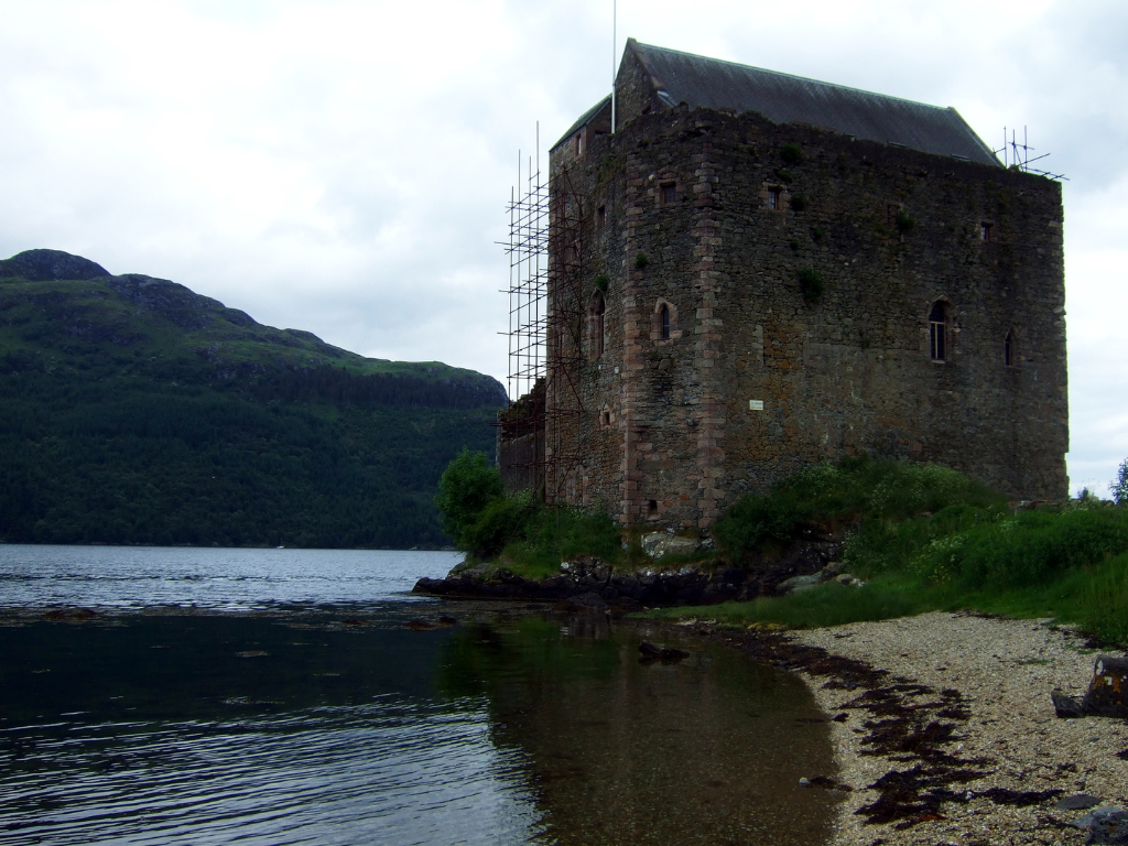 Carrick Castle, an impressive old tower house in a pretty spot on the banks of Loch Goil, long held by the Campbells and near the village of Lochgoilhead in Argyll in western Scotland.