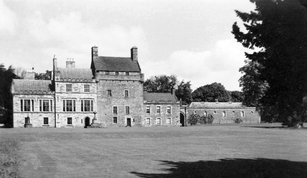 Bemersyde House, an imposing house with an old tower at the core, long a property of the Haigs and set in fine gardens and grounds, and near the attractive burgh of Melrose in the Borders.