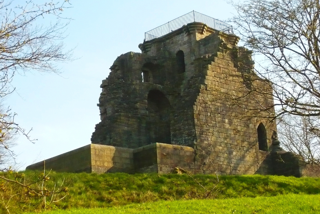 Crookston Castle is an unusually planned, tall and ruinous old tower in a quiet spot with fine views, held by the Stewarts of Lennox and once besieged by the great siege cannon Mons Meg, lying to the south of Glasgow in central Scotland.
