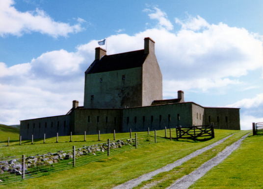 Corgarff Castle is an impressive old tower house, with later gun emplacements, held by the Forbeses and site of a famous massacre, in a impressive and mountainous location, some miles from Ballater in the Highlands of Scotland.