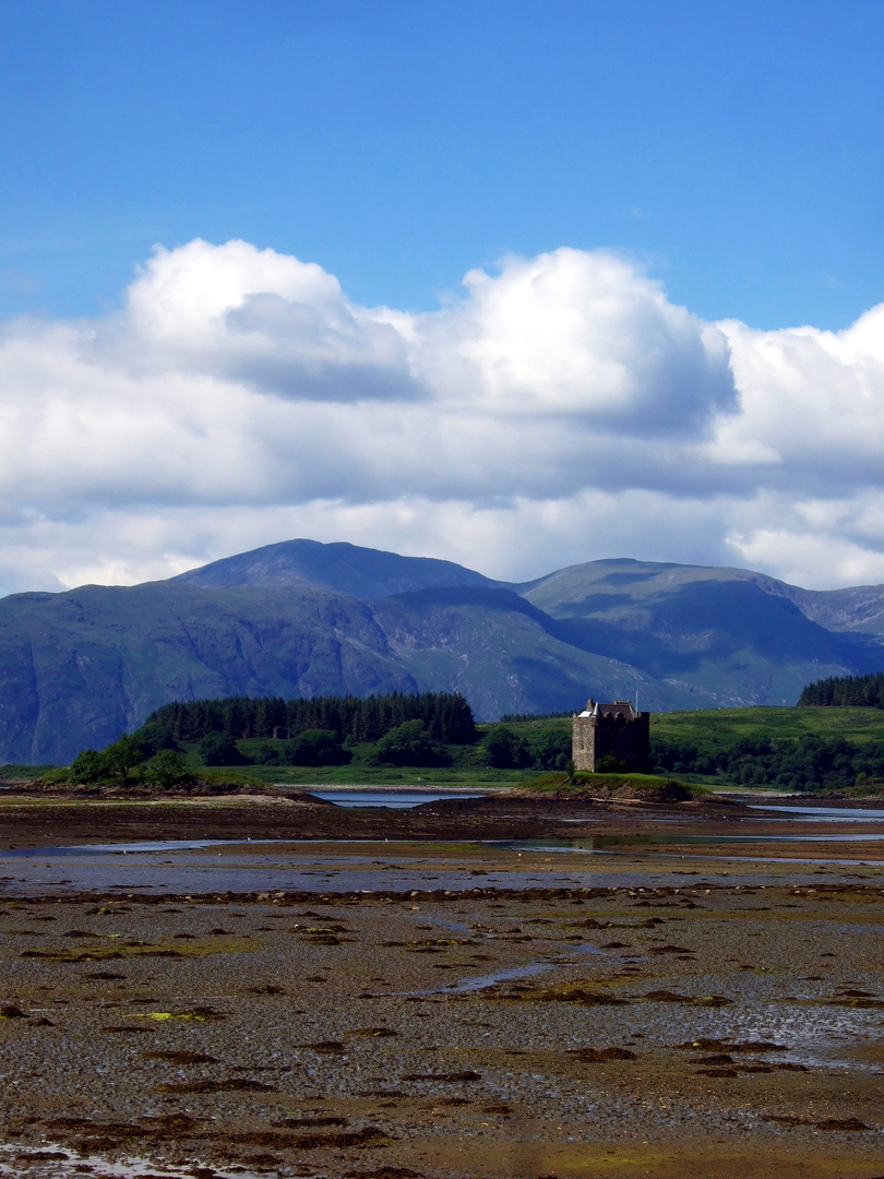 Castle Stalker is a restored scenic old tower house on an island in a beautiful spot in Appin north of Oban on the west coast of Scotland, long a property of the Stewarts of Appin.