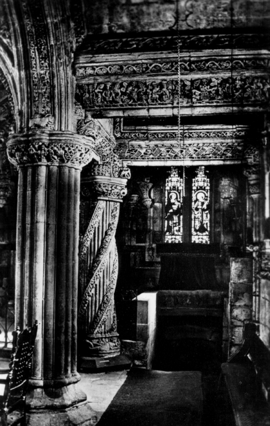 Interior showing pillars and stairs to crypt of Rosslyn Chapel, near Roslin Castle, an impressive, partly ruinous old stronghold on a rock above the River Esk, long held by the Sinlcairs and near the beautiful and intricately carved Rosslyn Chapel
