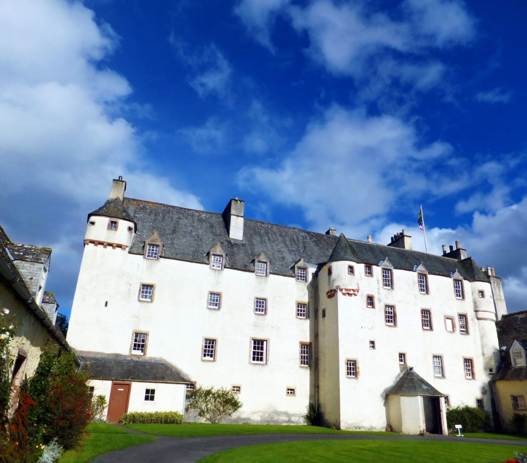 View of Traquair House, a fabulous homely old castle and house, long a property of the Stewarts and associated with Mary, Queen of Scots, in lovely grounds near Innerleithen in the Borders of Scotland.