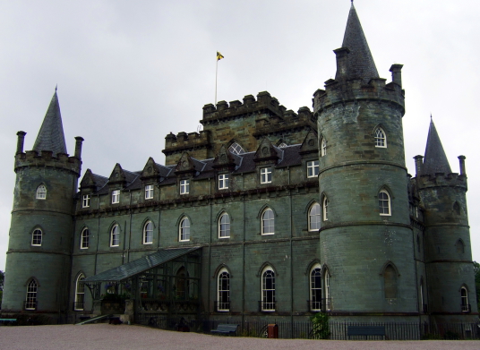 Inverary Castle, a magnificent towered mansion, the seat of the Campbell Dukes of Argyll and located among colourful gardens in a beautiful spot by Loch Fyne near the attractive burgh of Inveraray in Arygll.