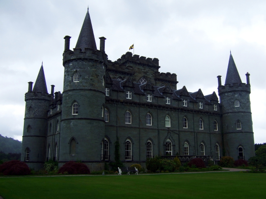 Inverary Castle, a magnificent towered mansion, the seat of the Campbell Dukes of Argyll and located among colourful gardens in a beautiful spot by Loch Fyne near the attractive burgh of Inveraray in Arygll.