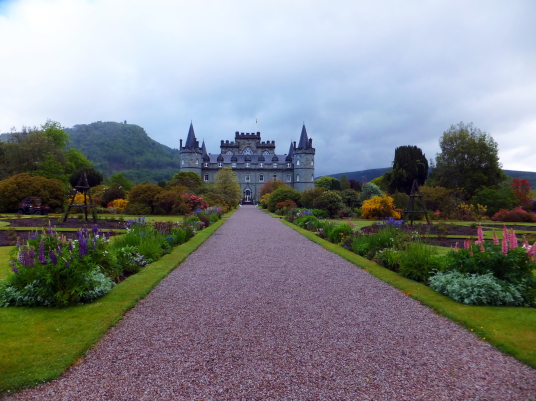 Inverary Castle, a magnificent towered mansion, the seat of the Campbell Dukes of Argyll and located among colourful gardens in a beautiful spot by Loch Fyne near the attractive burgh of Inveraray in Arygll.