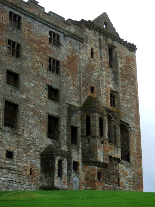Linlithgow Palace, a large, ruinous and impressive royal residence of the monarchs of Scotland and birthplace of Mary, Queen of Scots, in a scenic location in a park with a pond in the historic burgh of Linlithgow.