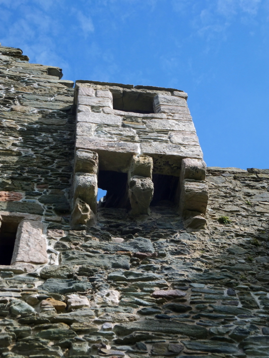 Machiocolated projection, Lochranza Castle, an imposing old ruinous fortress, standing on a spit of land in a stunningly beautiful spot at Lochranza to the north of the mountainous island of Arran on the west coast of Scotland.