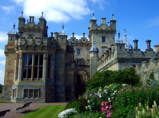 Floors Castle, the massive and magnificent mansion of the Kerr Dukes of Roxburghe, with a rich and magnificent interior, set in rolling grounds with a colourful walled garden, near Kelso in the Broders in southern Scotland.