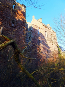 Roslin Castle, an impressive, partly ruinous old stronghold on a rock above the River Esk, long held by the Sinlcairs and near the beautiful and intricately carved Rosslyn Chapel