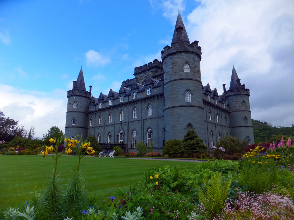 Inverary Castle, a magnificent towered mansion, the seat of the Campbell Dukes of Argyll and located among colourful gardens in a beautiful spot by Loch Fyne near the attractive burgh of Inveraray in Arygll.