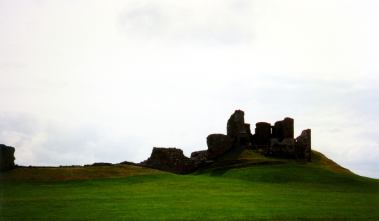 Duffus Castle, an interesting old ruinous medieval stronghold with a tower on a large motte and the remains of other building, held by the Sutherland family and near Elgin in Moray in northern Scotland.