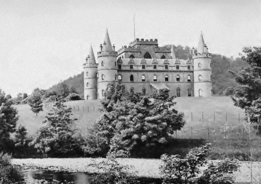 Inverary Castle, a magnificent towered mansion, the seat of the Campbell Dukes of Argyll and located among colourful gardens in a beautiful spot by Loch Fyne near the attractive burgh of Inveraray in Arygll.