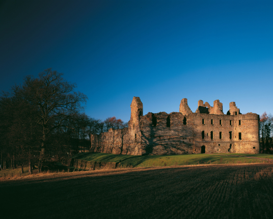 Balvenie Castle by Tom Wolf is a large ruinous courtyard castle with ranges of buildings enclosed by a strong curtain wall and ditch, in a pleasant and peaceful spot near Dufftown in Moray in northern Scotland.