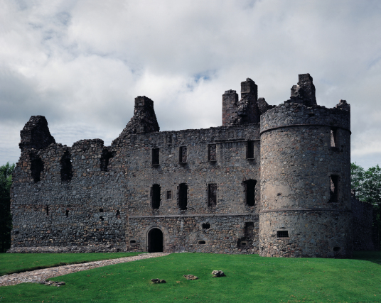 Balvenie Castle by Tom Wolf is a large ruinous courtyard castle with ranges of buildings enclosed by a strong curtain wall and ditch, in a pleasant and peaceful spot near Dufftown in Moray in northern Scotland.