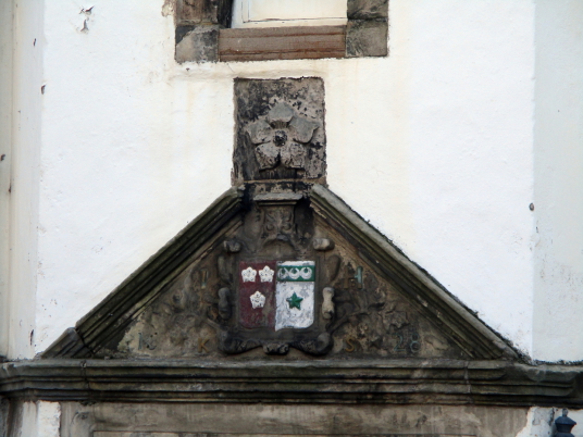 Coat of arms, Hamilton House, also known as Magdalen House, is an attractive old whitewashed building, located in the Preston area of Prestonpans in East Lothian in southeast Scotland, by Preston Tower and Northfield House, and built by the Hamiltons.