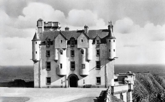 Dunbeath Castle, a handsome whitewashed castle on a spectacular cliff top location, in Caithness