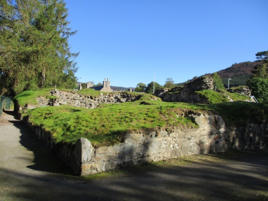 Kindrochit Castle, a fragmentary ruinous old royal stronghold, said to have been finally destroyed because of plague, and in the village of Braemar in Aberdeenshire in Scotland.