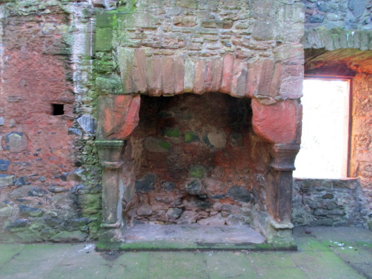 Fireplace, hall, Greenknowe Tower, a ruinous but an attractive old tower house, held by the Setons and then the Pringles, located in a pretty spot with old trees near the village of Gordon in the Borders.